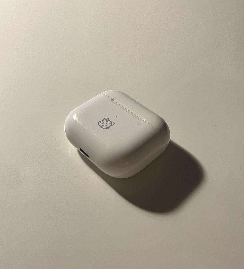 Side of my AirPods case with charging port