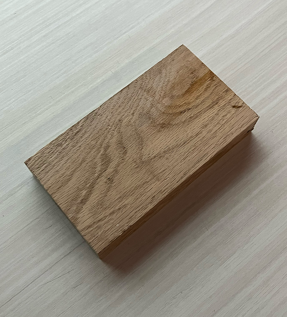 Wood has rough surface with a natural grain that can feel smooth when touching it, often used for furnitures or other handcraft items.